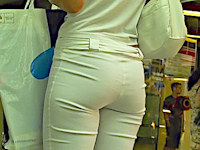 There's no way you can miss this sexy jeans video! The cutie dressed in white top and white tight pants looks incredibly hot!